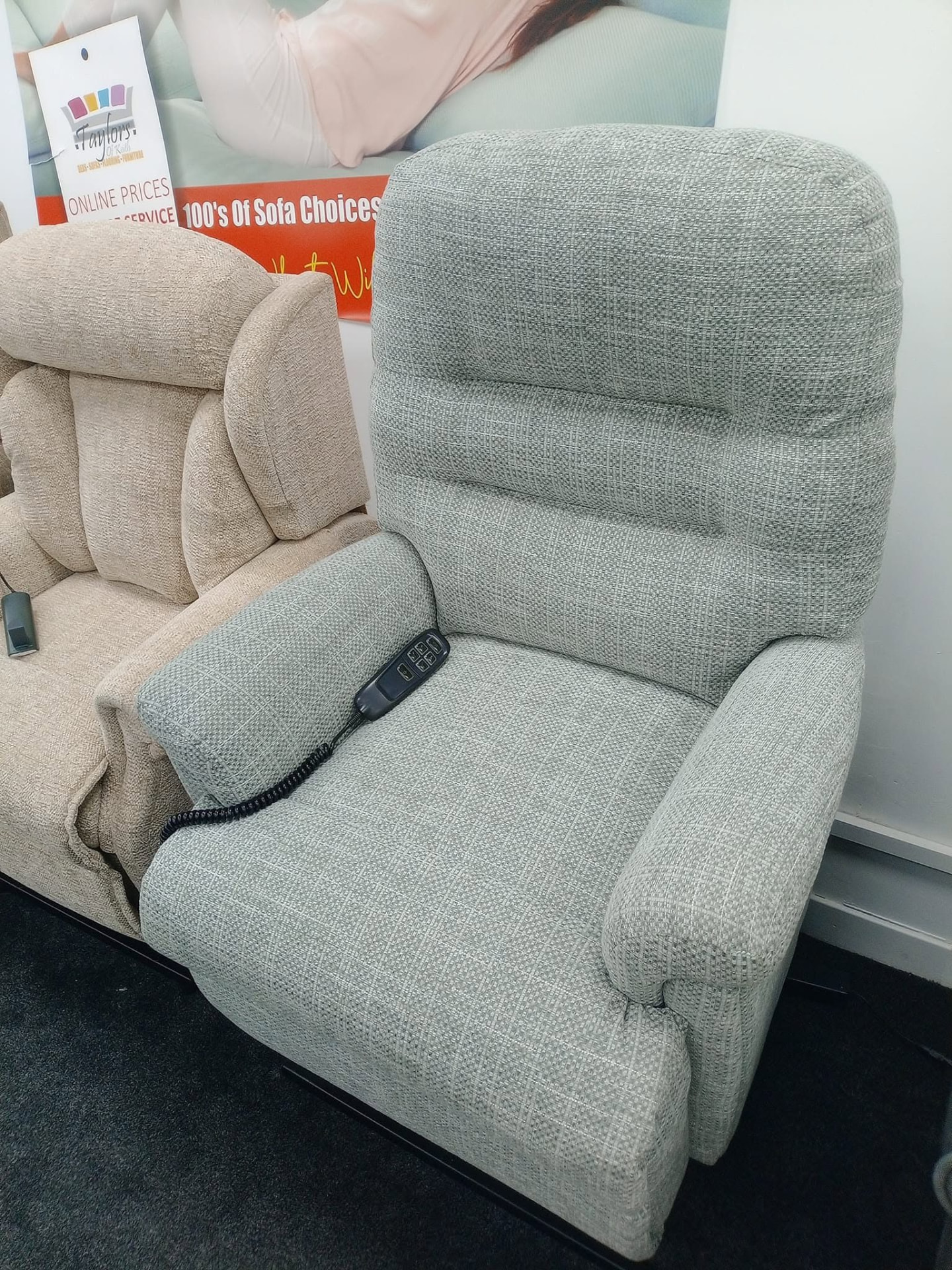 Sage green tweed riser recliner armchair on display in the Keith showroom